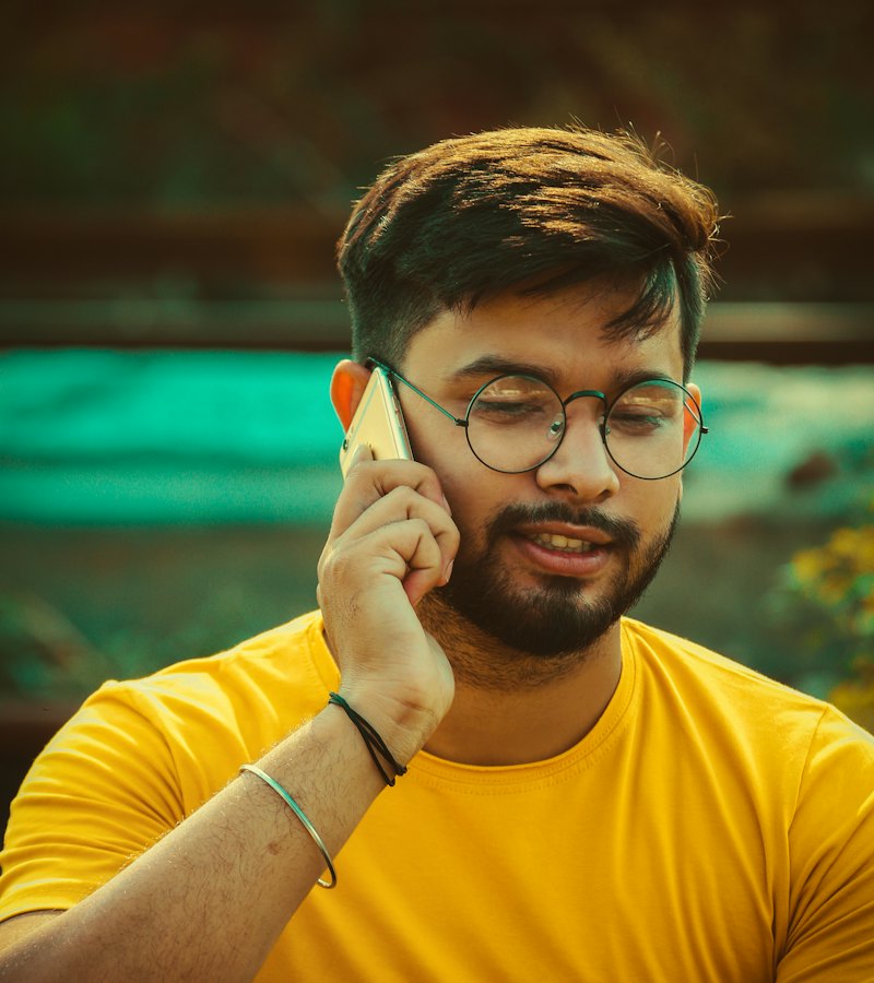 Smiling man on a phone call